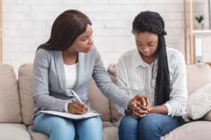 African American therapist with a patient